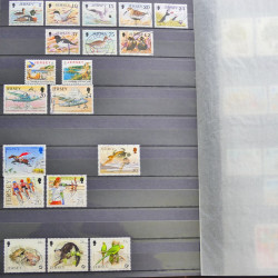 Lot de timbres de Jersey oblitérés en un album.