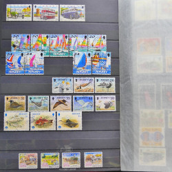 Lot de timbres de Jersey oblitérés en un album.