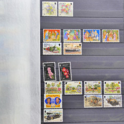 Lot de timbres de Jersey oblitérés en un album.