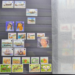 Lot de timbres de Jersey oblitérés en un album.