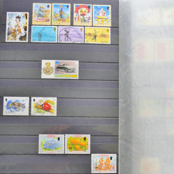 Lot de timbres de Jersey oblitérés en un album.