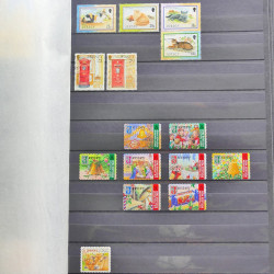 Lot de timbres de Jersey oblitérés en un album.