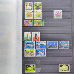 Lot de timbres de Jersey oblitérés en un album.