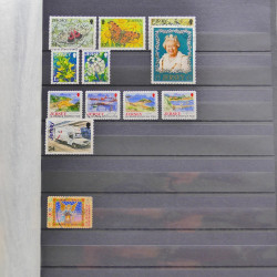 Lot de timbres de Jersey oblitérés en un album.