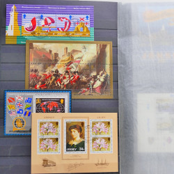 Lot de timbres de Jersey oblitérés en un album.