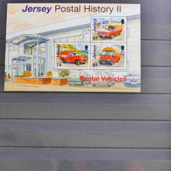 Lot de timbres de Jersey oblitérés en un album.