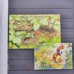 Lot de timbres de Jersey oblitérés en un album.