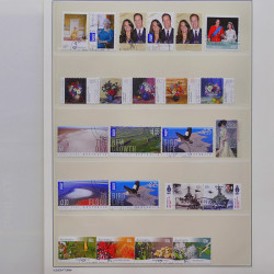 Vrac philatélique de timbres du monde neufs et oblitérés en un carton.