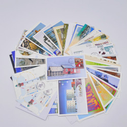 Vrac philatélique de timbres du monde neufs et oblitérés en un carton.