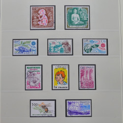 Vrac philatélique de timbres du monde neufs et oblitérés en un carton.