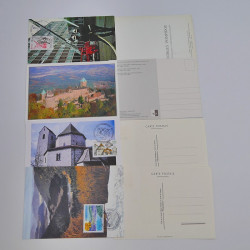 Vrac philatélique de timbres du monde neufs et oblitérés en un carton.