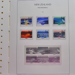 Vrac philatélique de timbres du monde neufs et oblitérés en un carton.