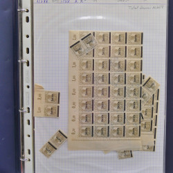 Vrac philatélique de timbres du monde neufs et oblitérés en un carton.