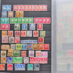 Vrac philatélique de timbres du monde neufs et oblitérés en un carton.