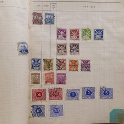 Vrac philatélique de timbres du monde neufs et oblitérés en un carton.