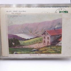 Vrac philatélique de timbres du monde neufs et oblitérés en un carton.