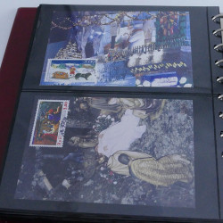 Collection commémoratifs thématique Noel en un album.