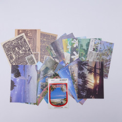 Vrac philatélique de timbres du monde neufs et oblitérés en un carton.