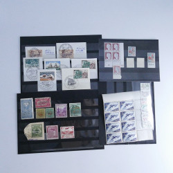 Vrac philatélique de timbres du monde neufs et oblitérés en un carton.