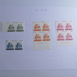 Vrac philatélique de timbres du monde neufs et oblitérés en un carton.