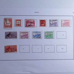 Vrac philatélique de timbres du monde neufs et oblitérés en un carton.