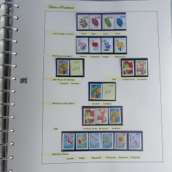 Vrac philatélique de timbres du monde neufs et oblitérés en un carton.