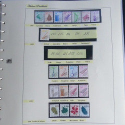 Vrac philatélique de timbres du monde neufs et oblitérés en un carton.