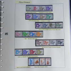 Vrac philatélique de timbres du monde neufs et oblitérés en un carton.