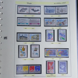 Vrac philatélique de timbres du monde neufs et oblitérés en un carton.