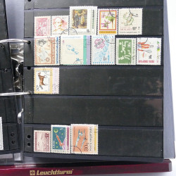 Lot massif de timbres d'Europe neufs et oblitérés en 4 albums.