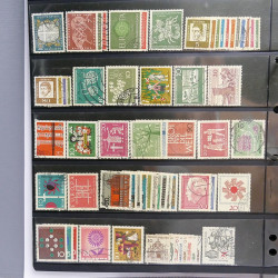 Lot massif de timbres d'Europe neufs et oblitérés en 4 albums.