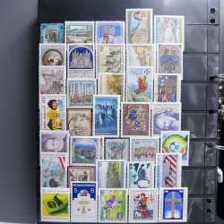 Lot massif de timbres d'Europe neufs et oblitérés en 4 albums.