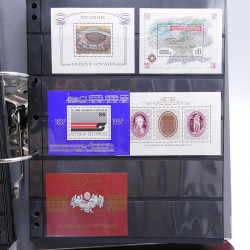 Lot massif de timbres d'Europe neufs et oblitérés en 4 albums.