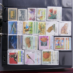 Lot massif de timbres d'Europe neufs et oblitérés en 4 albums.