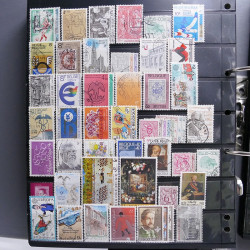 Lot massif de timbres d'Europe neufs et oblitérés en 4 albums.