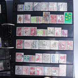 Lot massif de timbres d'Europe neufs et oblitérés en 4 albums.
