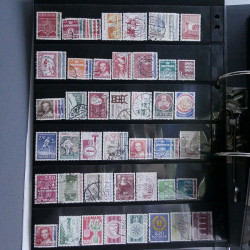 Lot massif de timbres d'Europe neufs et oblitérés en 4 albums.