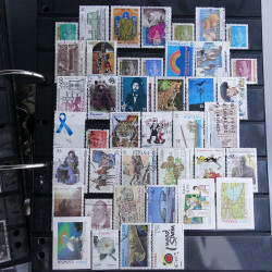 Lot massif de timbres d'Europe neufs et oblitérés en 4 albums.