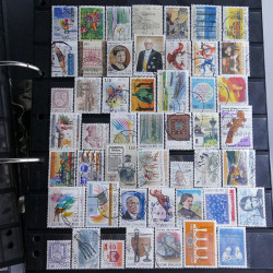 Lot massif de timbres d'Europe neufs et oblitérés en 4 albums.