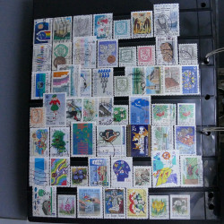 Lot massif de timbres d'Europe neufs et oblitérés en 4 albums.