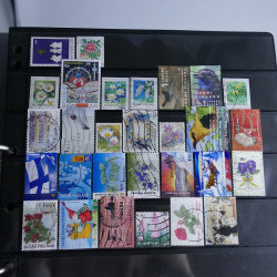 Lot massif de timbres d'Europe neufs et oblitérés en 4 albums.