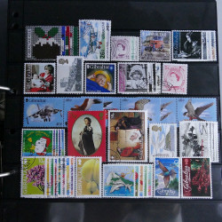 Lot massif de timbres d'Europe neufs et oblitérés en 4 albums.