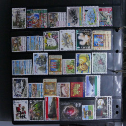 Lot massif de timbres d'Europe neufs et oblitérés en 4 albums.