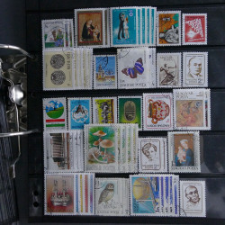 Lot massif de timbres d'Europe neufs et oblitérés en 4 albums.