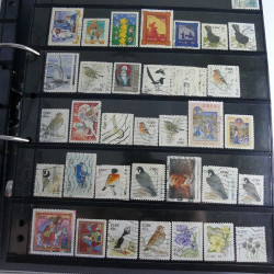 Lot massif de timbres d'Europe neufs et oblitérés en 4 albums.