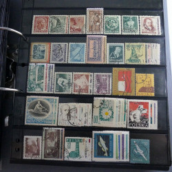 Lot massif de timbres d'Europe neufs et oblitérés en 4 albums.