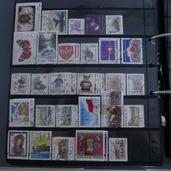 Lot massif de timbres d'Europe neufs et oblitérés en 4 albums.