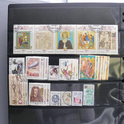 Lot massif de timbres d'Europe neufs et oblitérés en 4 albums.