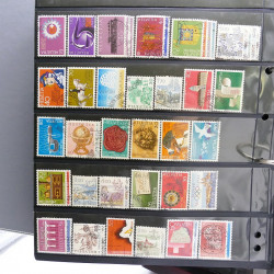 Lot massif de timbres d'Europe neufs et oblitérés en 4 albums.