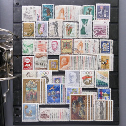 Lot massif de timbres d'Europe neufs et oblitérés en 4 albums.